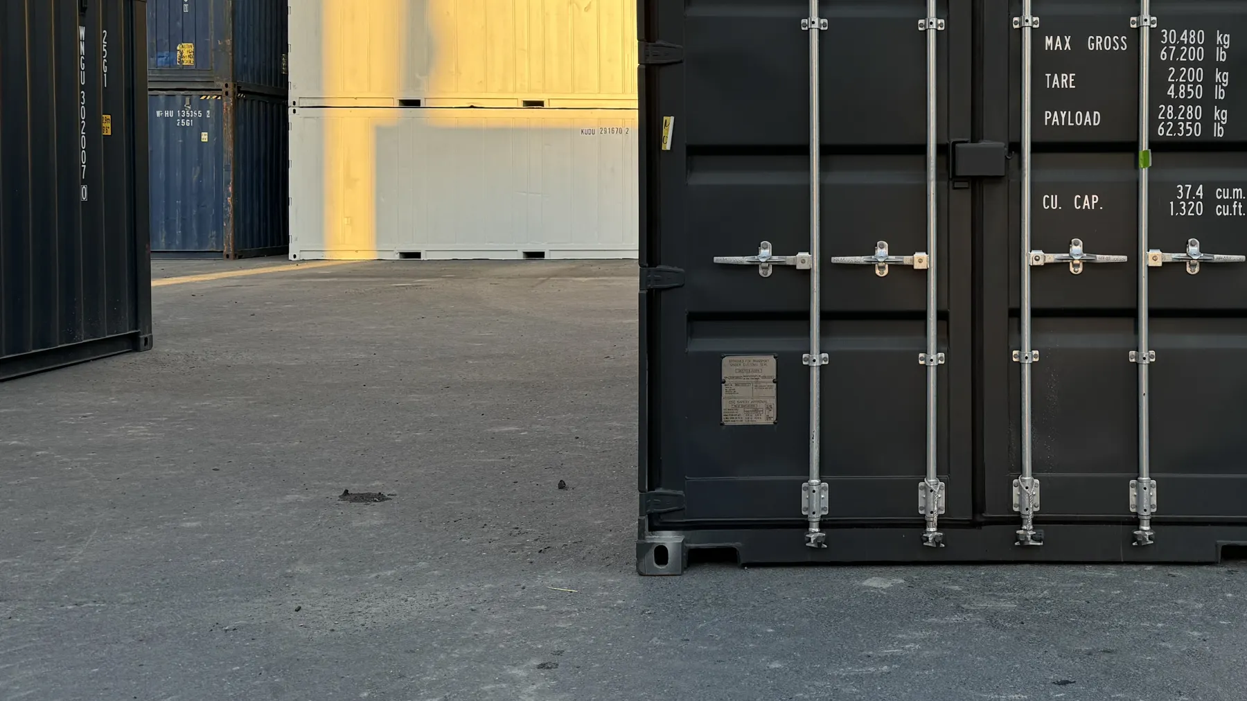 New shipping container in the Sunstate Containers yard at sunset